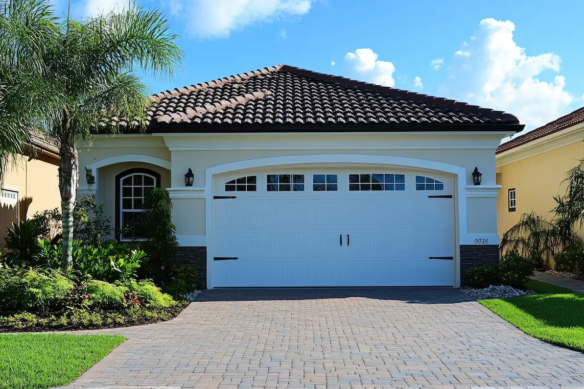 Vecteezy New One Story Home With A Tile Roof And A Brick Paver Driveway 50784015